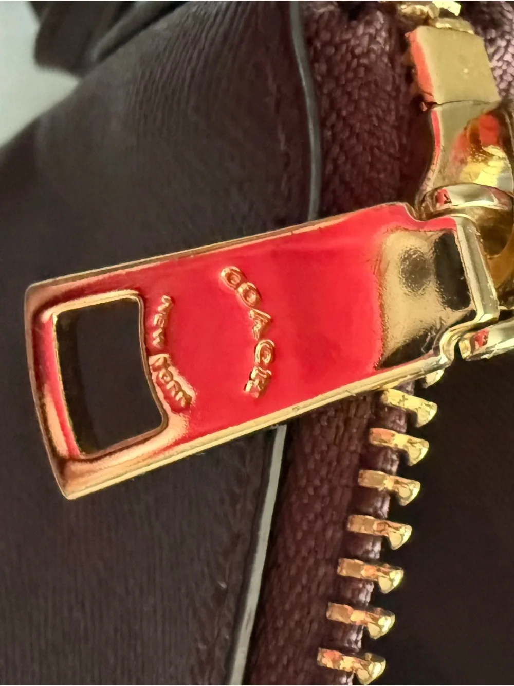 Coach burgundy Pebbled Leather Messenger with Gold Hardware